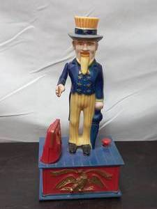 lot 48 image: Vintage Plastic Uncle Sam Mechanical Bank