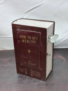 lot 59 image: Vintage Metal Wind Up Mechanical Book Bank