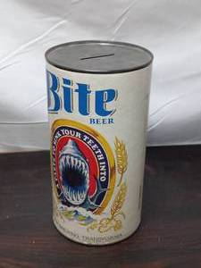 lot 90 image: Vintage 1981 Silly Savers Bite Beer Can Bank