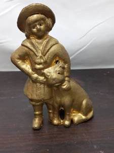 lot 134 image: Old Cast Iron Girl And Dog Coin Bank