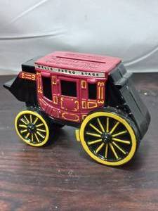 lot 141 image: Wells Fargo Stagecoach Advertisement Coin Bank