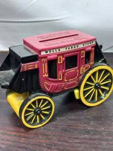 lot 142 image: Wells Fargo Stagecoach Advertisement Coin Bank