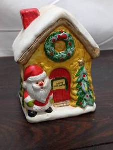 lot 166 image: Vintage Ceramic Santa House Coin Bank