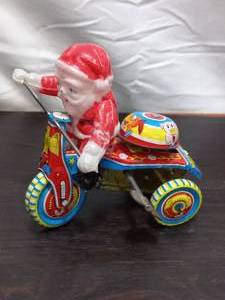 lot 177 image: Vintage Wind Up Tin Litho Trike Tricycle With Plastic Santa