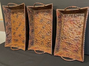 lot 104 image: Set of Three Decorative Metal Nesting Trays