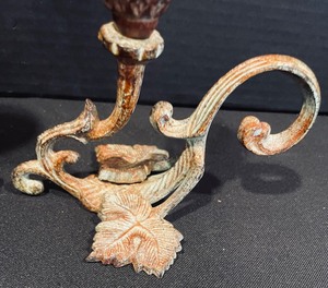 lot 322 image: Decorative Cast Iron Candle Holders