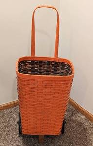 lot 259 image: Orange Painted Woven Rolling Market Cart