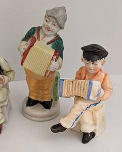 lot 426 image: Vintage Japanese Porcelain Accordion Playing Figurines