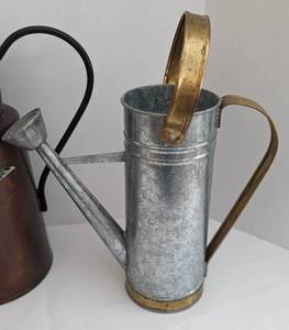 lot 427 image: Three Decorative Metal Watering Cans