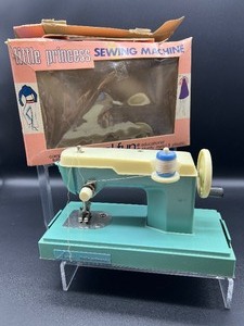 lot 212 image: Sew-Ette and Little Princess Miniature Childs Toy Sewing Machine
