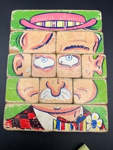 lot 386 image: Vintage Face Puzzle, Galileo Thermometer, and Wind-Up Toys