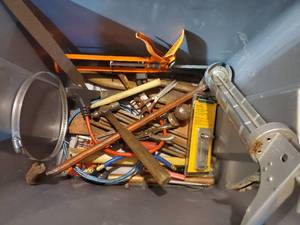 lot 1783 image: Lot of  Hand Tools - Caulk Guns, Pry Bar, Ball Peen Hammer, Hose Clamp, 3-way Extension Cord, Paper Punch, Scissors, Hitch Ball and more