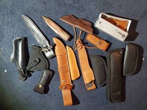 lot 1805 image: Lot of (14) GunKnife Accessories - Knife Sheath  Case (x12),  Gun Holsters (x2)