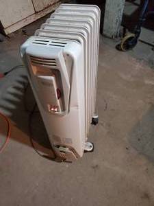 lot 1822 image: DeLonghi 6-level Portable Heater