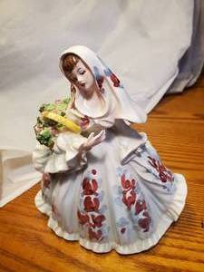 lot 1862 image: Lady in Flower Dress and Veil with Basket theme Ceramic Table Dcor