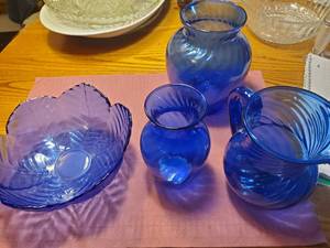 lot 1884 image: Lot of (4) Blue Glass Glassware - Small Vase, Large Vase, Pitcher, Leaf Bowl