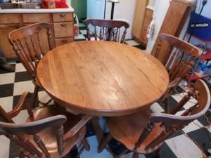lot 1919 image: Wooden Dining Table Set - 4 Round Dining Table, Wood Dining Arm Chairs (x2), Wood Dining Chairs (x3),  Leaves (x2)