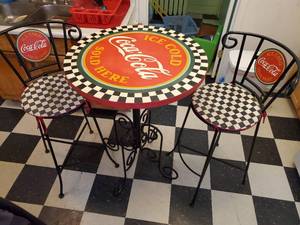 lot 1924 image: Coca-Cola Patio Set - Highboy Table and Two Padded Chairs