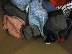 box of new over stock clothes ...