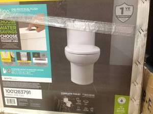 American Standard Tofino Complete 1-Piece 1.1 GPF Dual Flush Elongated Toilet in White with Slow Close Seat