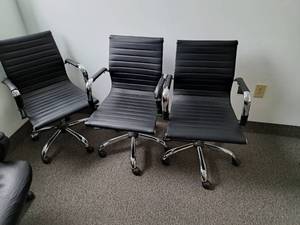 lot 142 image: Lot of (3) Black LeatherMetal Rolling Office Arm Chairs