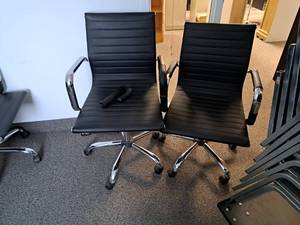 lot 144 image: Lot of (2) Black LeatherMetal Rolling Office Arm Chairs