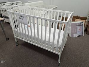 lot 203 image: Foldable Baby Crib
