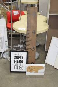 lot 508 image: Lot of (3) Wall Decor - Large Ruler Wall Decor, A Super Hero Sleeps Here Framed Wall Dcor, Bear theme Wall Clock