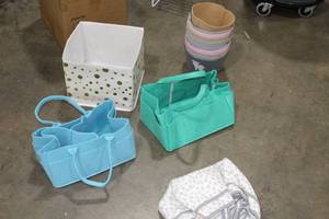 lot 633 image: Lot of (13) Baby Accessories - Cloth Caddys, Cloth Storage Cans, Storage Bin