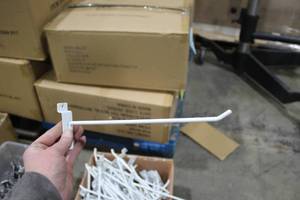 lot 489 image: Lot of (85) 11 Slatwall Hangers