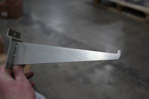 lot 491A image: Lot of (26) 8-12 Slatwall Shelf Brackets