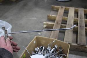 lot 492C image: Lot of (120) 12-12 Slatwall Hangers