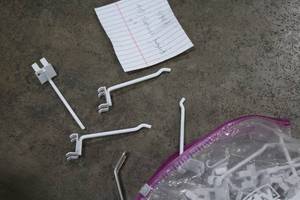 lot 494A image: Lot of (40) 4 Slatwall Hangers