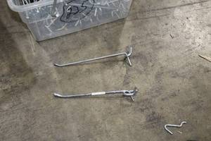 lot 497B image: Lot of (225) 7 Pegboard Hangers