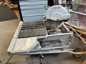lot 76 image: Ridgid 10 Inch Tile Saw with Stand