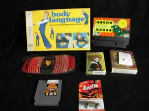 lot 234 image: Variety Lot of Video Games CDs Board Games