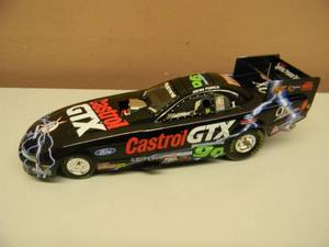 lot 15 image: ACTION RACING 124 SCALE DIE-CAST  - JOHN FORCE CASTROL GTX  9X CHAMPION 2000 MUSTANG FUNNY CAR - 1 of 20,016 - NEW IN BOX - AWESOME PIECE - SEE PICTURES