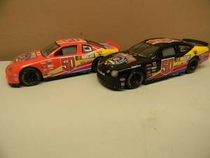 lot 17 image: RACING CHAMPIONS 50TH ANNIVERSARY 1948-1998 - 124TH SCALE CHEVY MONTE CARLO & FORD TAURUS - 1 of 27000 SET - NEW IN BOX - SEE PICTURES