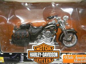 lot 39 image: MAISTO 118 SCALE DIE-CAST METAL COLLECTIBLE 95TH ANNIVERSARY MODELS - #31360 FLSTS HERRITAGE SPRINGER - FXDWG DYNA WIDE GLIDE - FLHT ELECTRA GLIDE MOTOR CYCLES HARLEY-DAVIDSON - NICE - NEW IN BOX - GREAT PIECES - SEE PICTURES