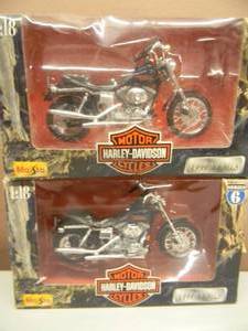 lot 41 image: MAISTO 118 SCALE DIE-CAST METAL COLLECTIBLE 1999 MODELS #31360 - FXDL DYNA LOW RIDER -  FXDL DYNA LOW RIDER MOTOR CYCLES HARLEY-DAVIDSON - NICE - NEW IN BOX - GREAT PIECES - SEE PICTURES