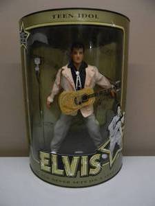 lot 48 image: ELVIS THE SUN NEVER SETS ON A LEGAND TEEN IDOL FIGURE - 1993 HASBRO - NICE - NEW IN BOX - GREAT PIECE - APPROX 13 - SEE PICTURES