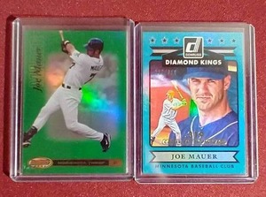 lot 52 image: (2) Numbered Joe Mauer Cards