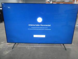 lot 60 image: Samsung - 65 Class 7 Series LED 4K UHD Smart Tizen TV ModelUN65TU7000FXZA (LIGHT SHADING AT THE BOTTOM)