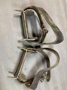 Pair of Vintage Strap-On Ice Cleats and a Polaris ATV Service Manual