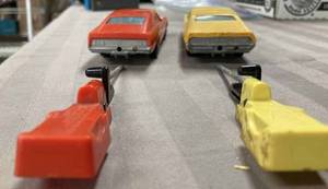Three Ford Pace Cars with Launchers and a Set of Three Funmate Formula One Race Cars with Spring Launchers