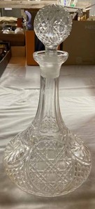 Nine Vintage Decanters and Bottles