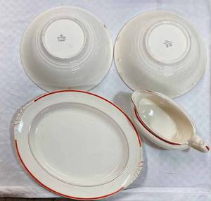 Four Nautilus Pieces, a Snowflake Casserole Dish, and Four Clear Glass Pieces including a Baking Dish