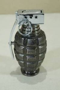 lot 76 image: Novelty Hand Grenade Lighter
