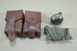 lot 98 image: Leather Pouch with Oil Canister