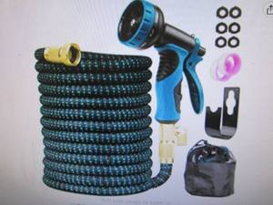 new Expandable Garden Hose 100ft Wa...